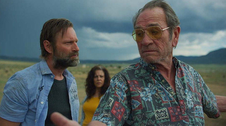 Aaron Eckhart and Tommy Lee Jones wander in Wander