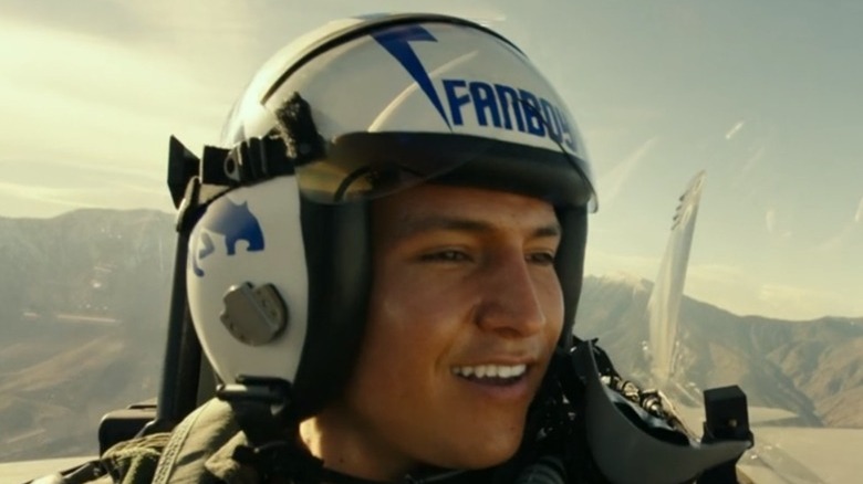 Fanboy smiles in his fighter's cockpit