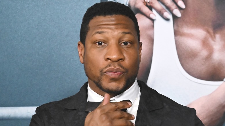 Jonathan Majors looking into camera