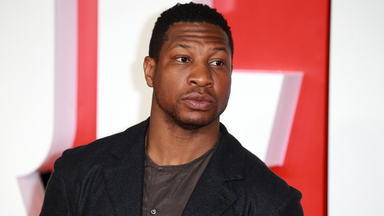 Jonathan Majors looking off camera