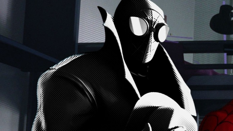 Spider-Man Noir holding hat