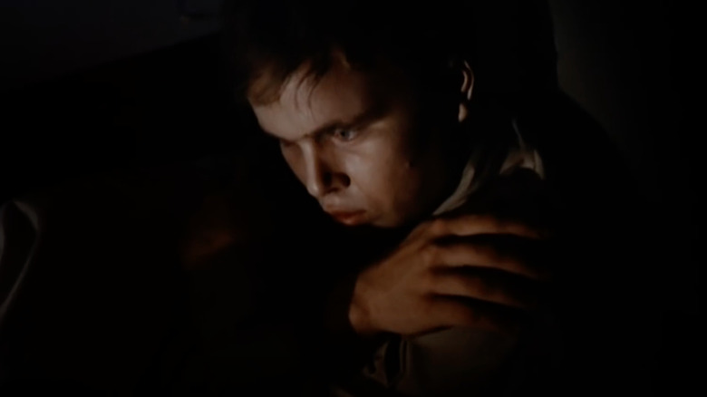 Clint Howard in darkness