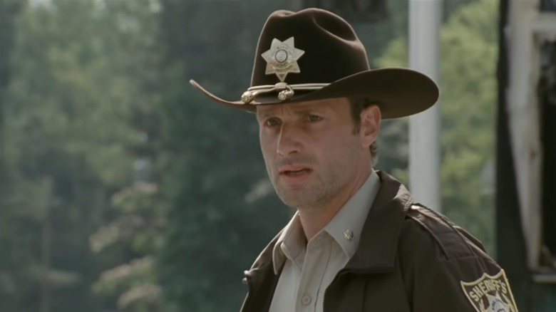 Rick wearing sheriff outfit and hat