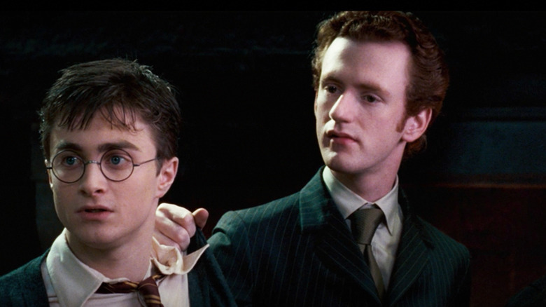 Percy Weasley with Harry Potter