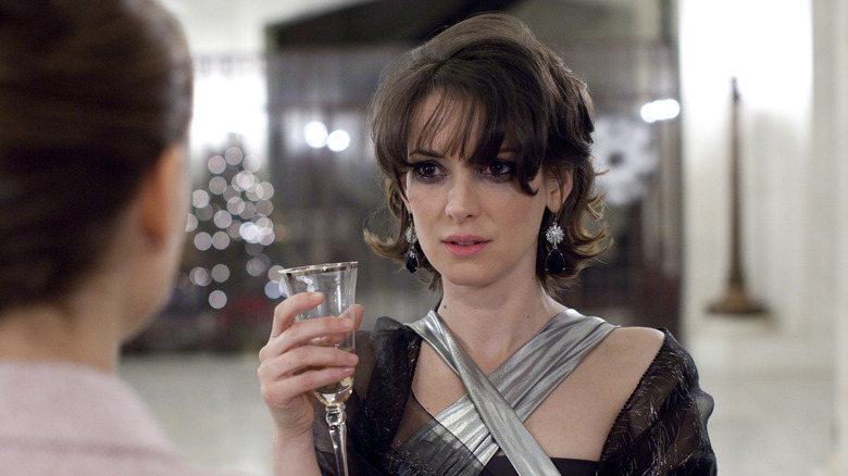 Winona Ryder raises a glass