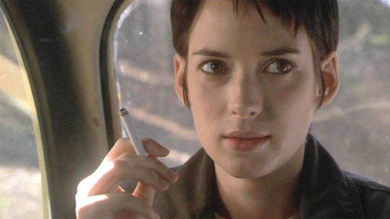 Winona Ryder smokes a cigarette