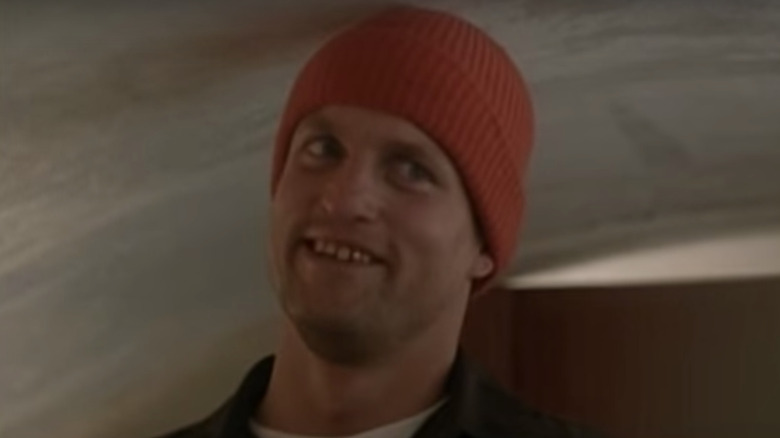 Woody Harrelson in orange hat