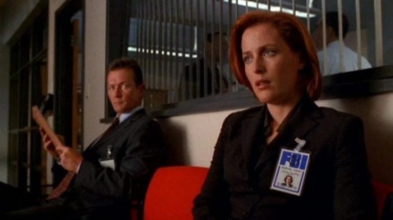 Scully sitting next to Doggett