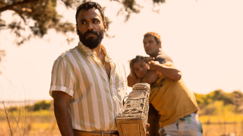 Carlos Singh stares into the distance in "Outer Banks"