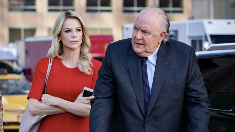 Kelly and Ailes walk on street