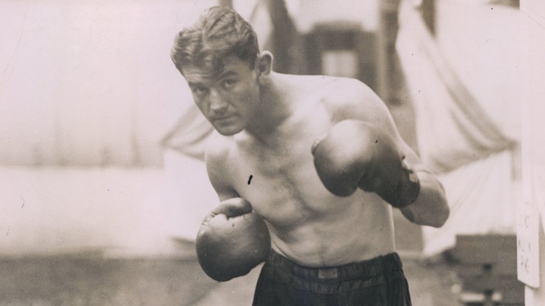 James Braddock poses in boxing gloves