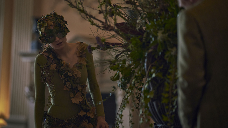 Emma Corrin as Diana dressed as tree