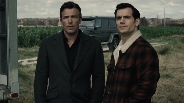 Clark Kent and Bruce Wayne standing together