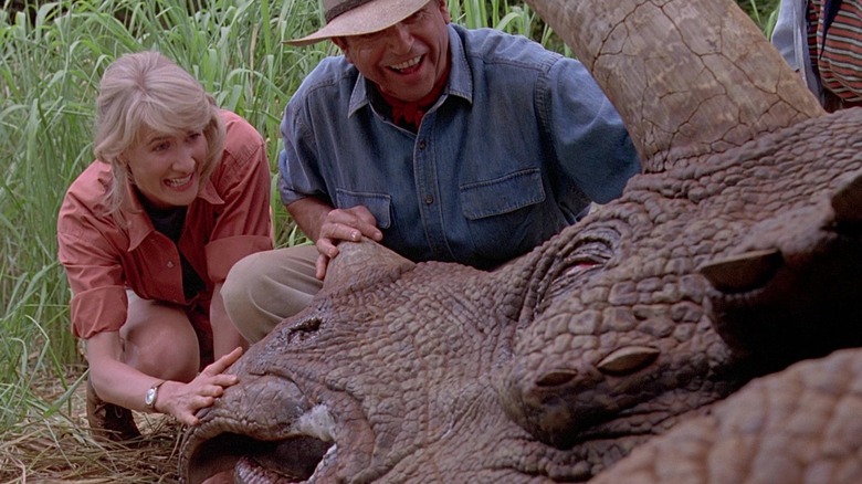 Dr. Sattler and Dr. Grant gleeful about a triceratops