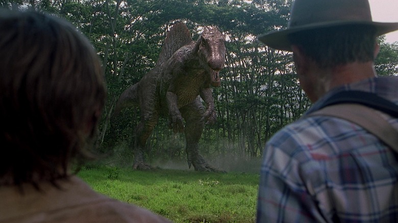 Spinosaurus stares down the group