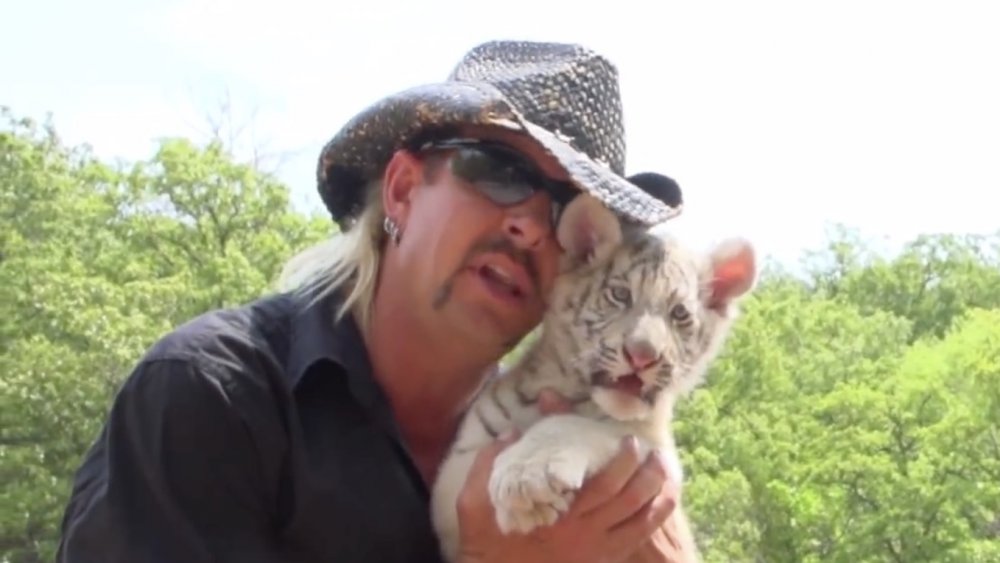 Joe Exotic and a tiger cub