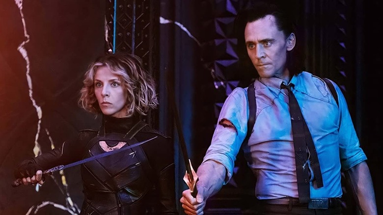 Loki and Sylvie preparing to fight