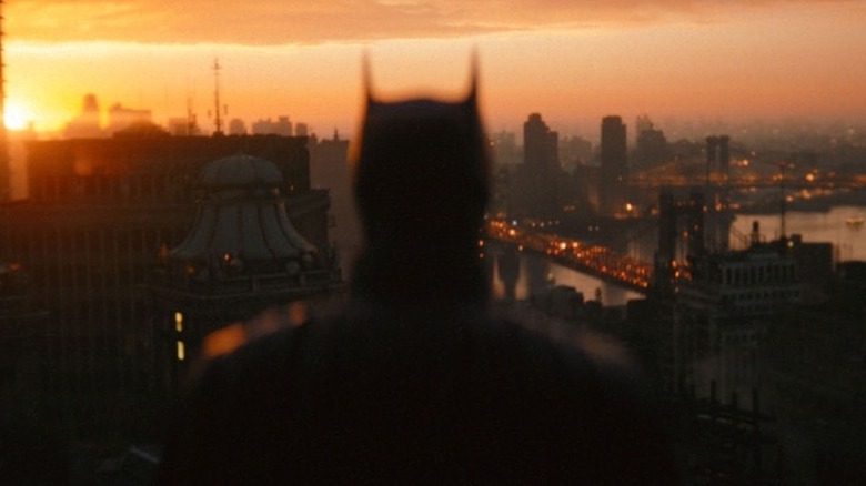 The Batman watches over the Gotham skyline