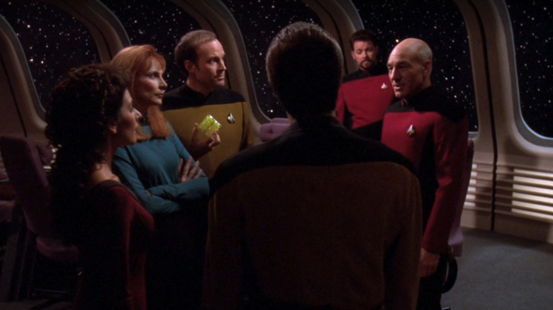 Picard shows the crew the data module