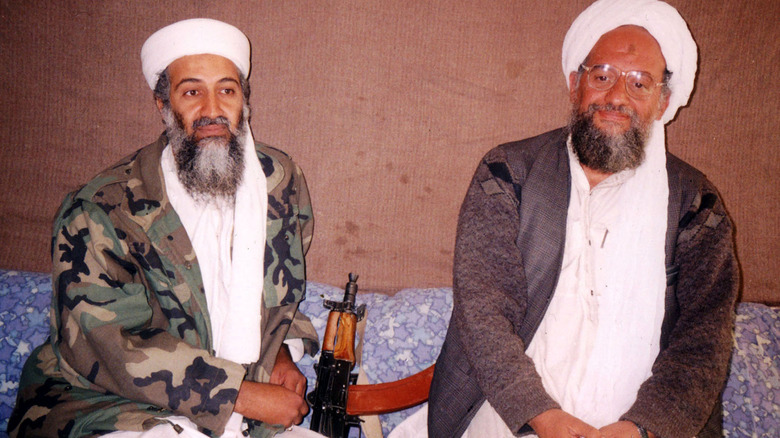 Osama Bin Laden and Ayman Al-Zawahiri sit