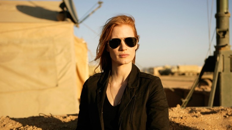 Maya wearing sunglasses and a black jacket