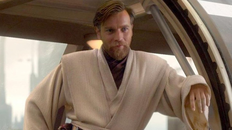 Obi-Wan leaning in doorframe