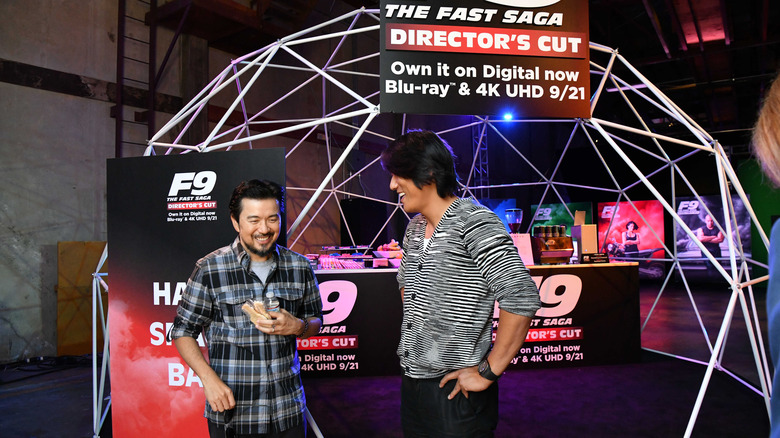 Justin Lin and Sung Kang laughing at F9 Fest