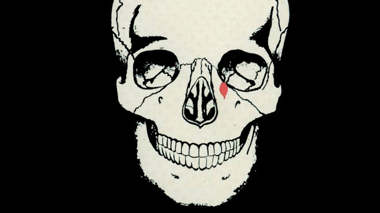 A skull grins maliciously