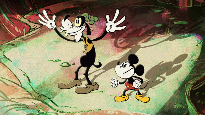 Goofy and Mickey smiling