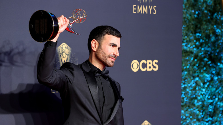 Brett Goldstein Emmy trophy hoist