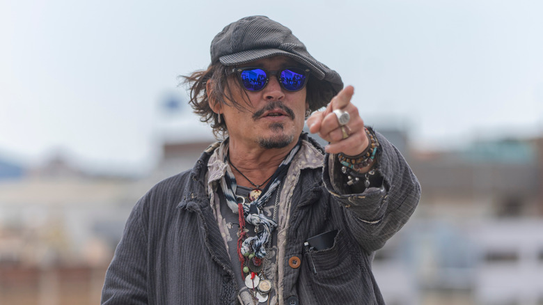 Johnny Depp pointing at the camera 