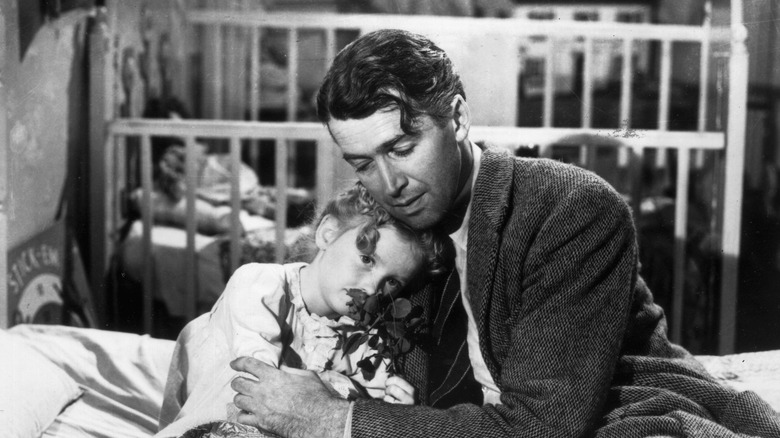 James Stewart holding the actress who plays Zuzu