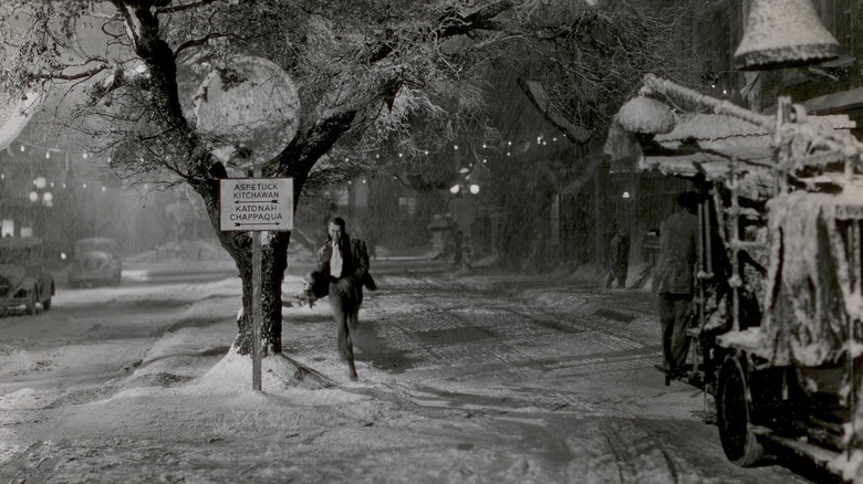 James Stewart running through fake snow