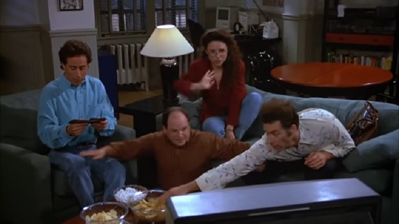 Characters sitting down to watch Jerry