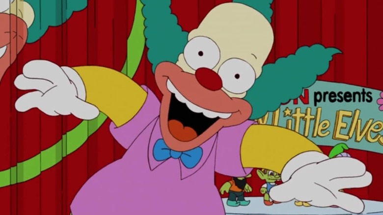 Krusty smiles at the camera