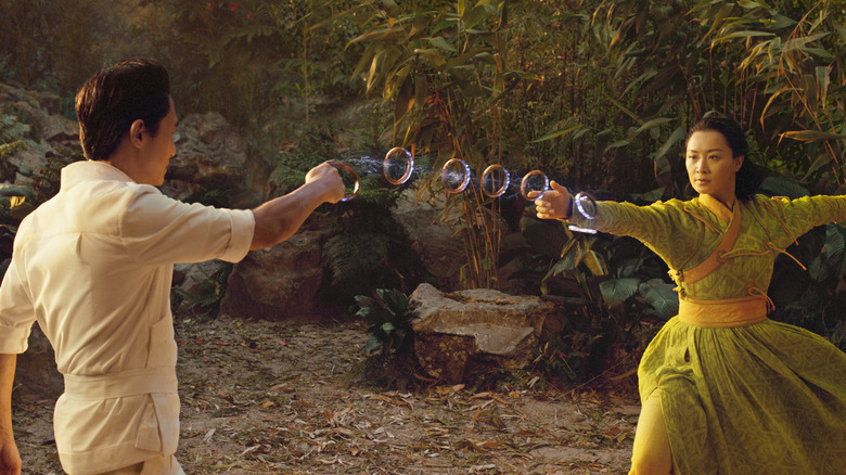 Tony Leung and Fala Chen fighting with rings