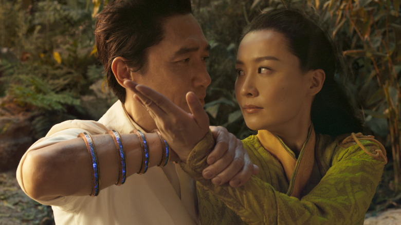 Tony Leung grabs Fala Chen's arm