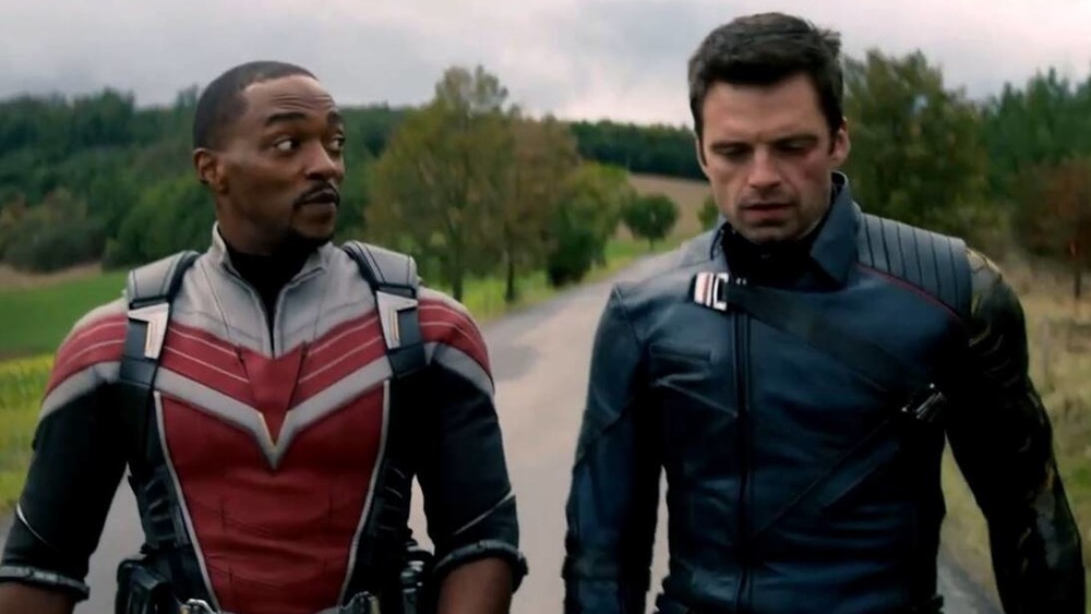 Sam and Bucky walk down a road