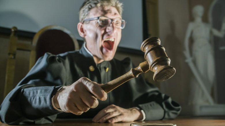 Judge yelling and banging a gavel