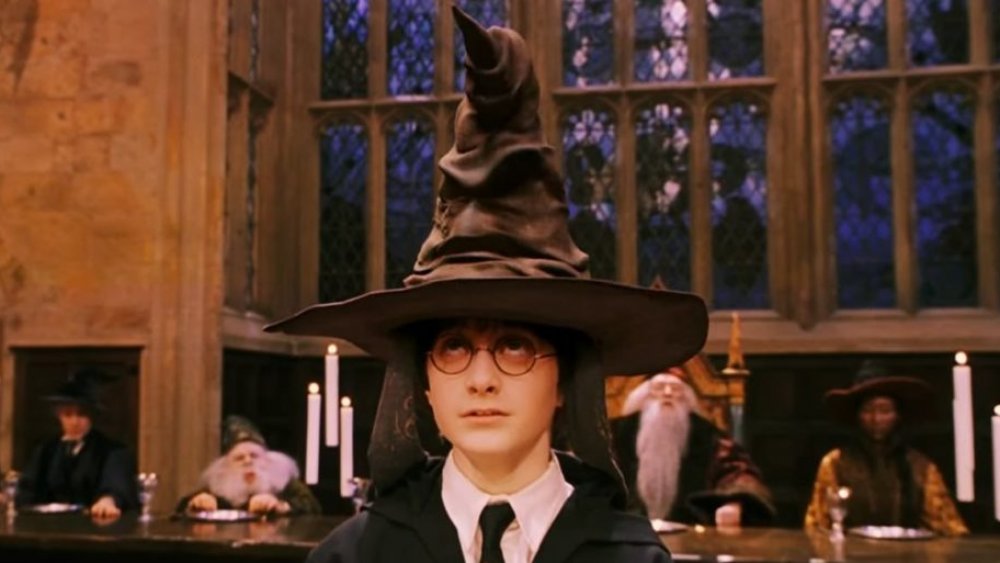 Harry Potter wearing the Sorting Hat in Harry Potter and the Sorcerer's Stone