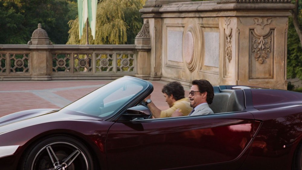 Robert Downey Jr. as Tony Stark and Mark Ruffalo as Bruce Banner, riding in a hot rod