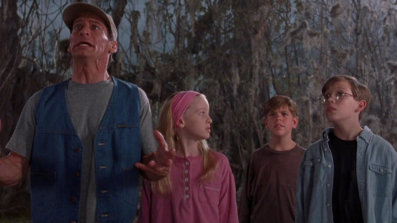 Ernest looks anguished while three kids look confused