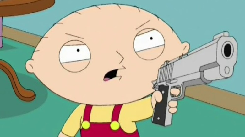 Stewie holds a gun