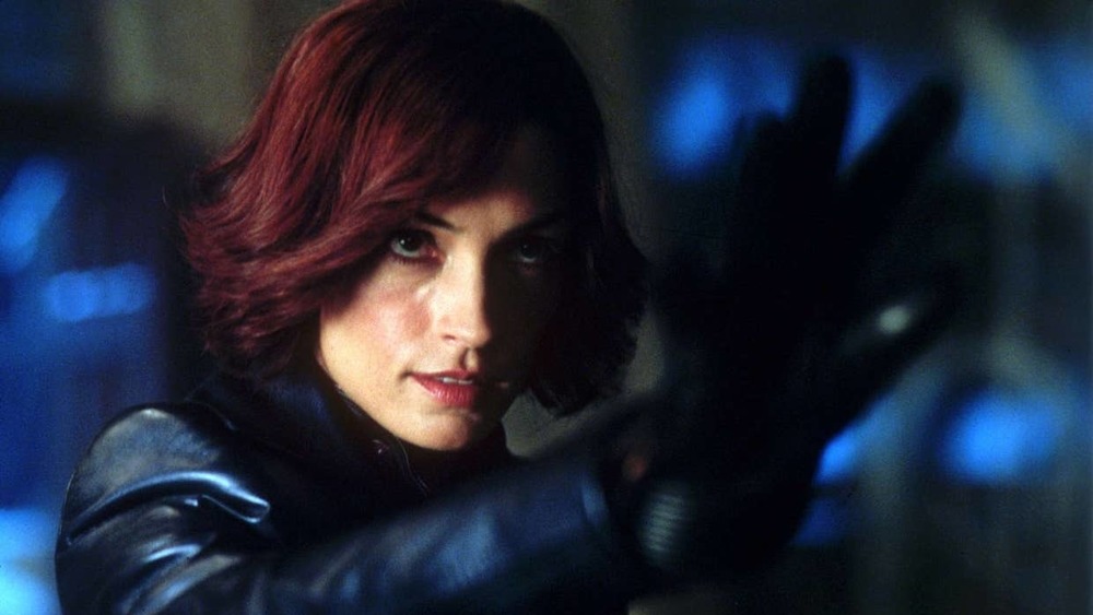 Famke Janssen holds out hand X2: X-Men United