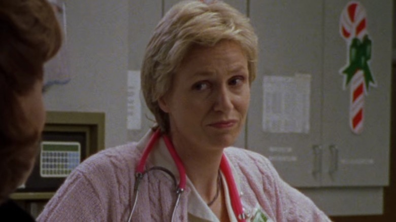 The nurse looks at Emily