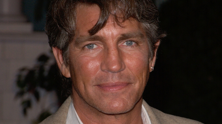 Eric Roberts looking into camera