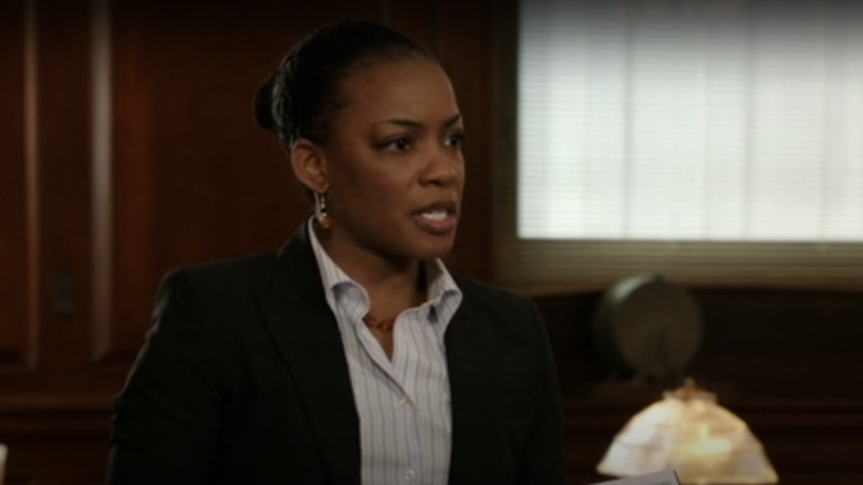 Aunjanue Ellis in a courtroom scene