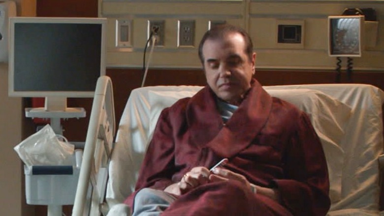 Chazz Palminteri filing his nails in a hospital bed