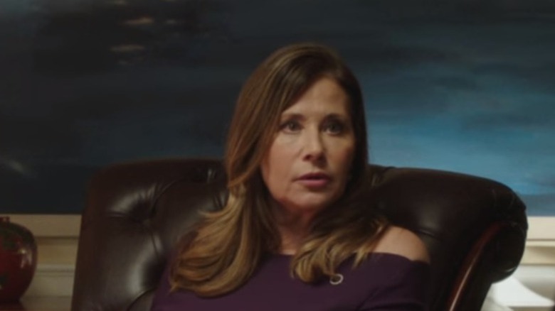 Lorraine Bracco sitting in a desk chair