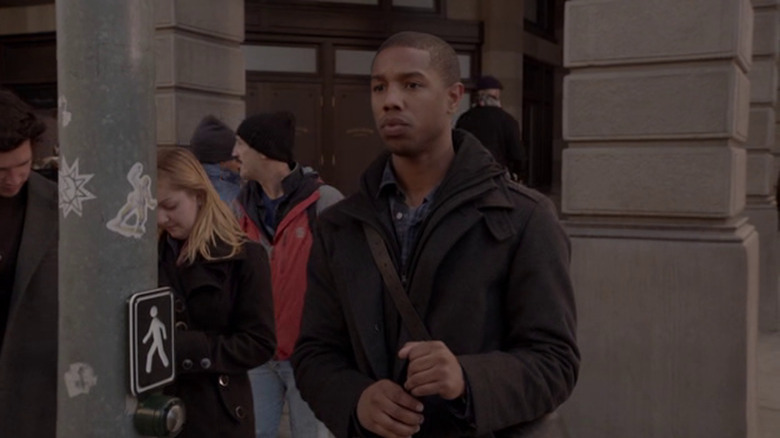 Michael B. Jordan standing at red light